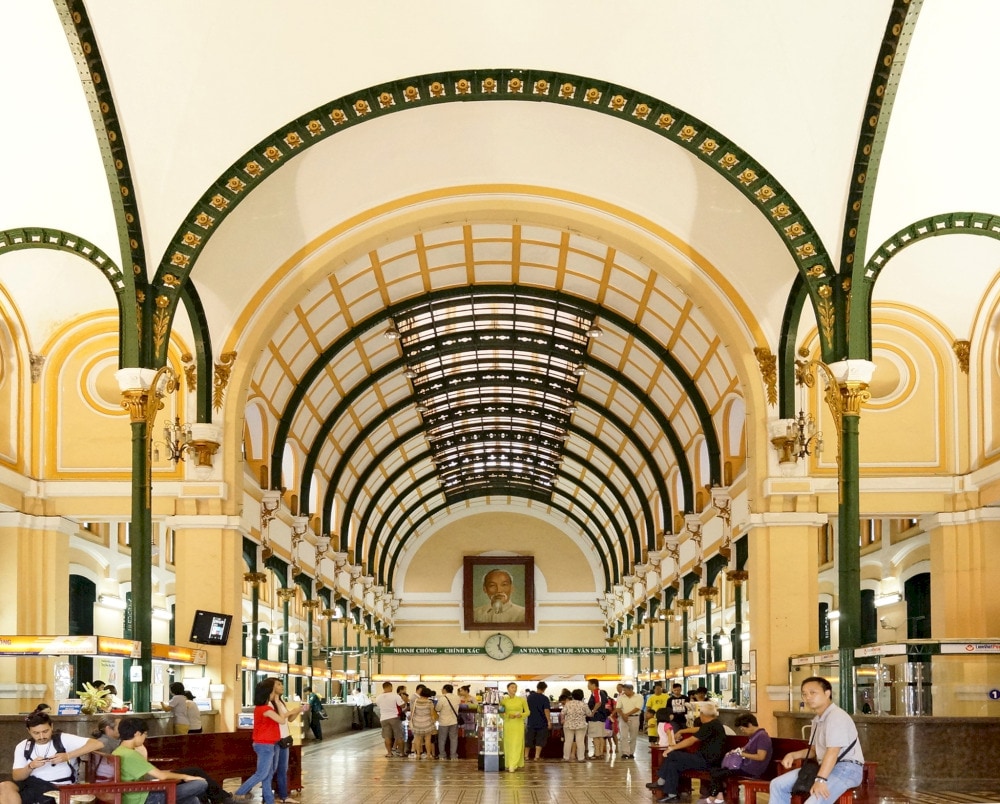 Visitors are immediately captivated by its high barrel-vaulted ceiling, elegantly supported by intricate ironwork columns